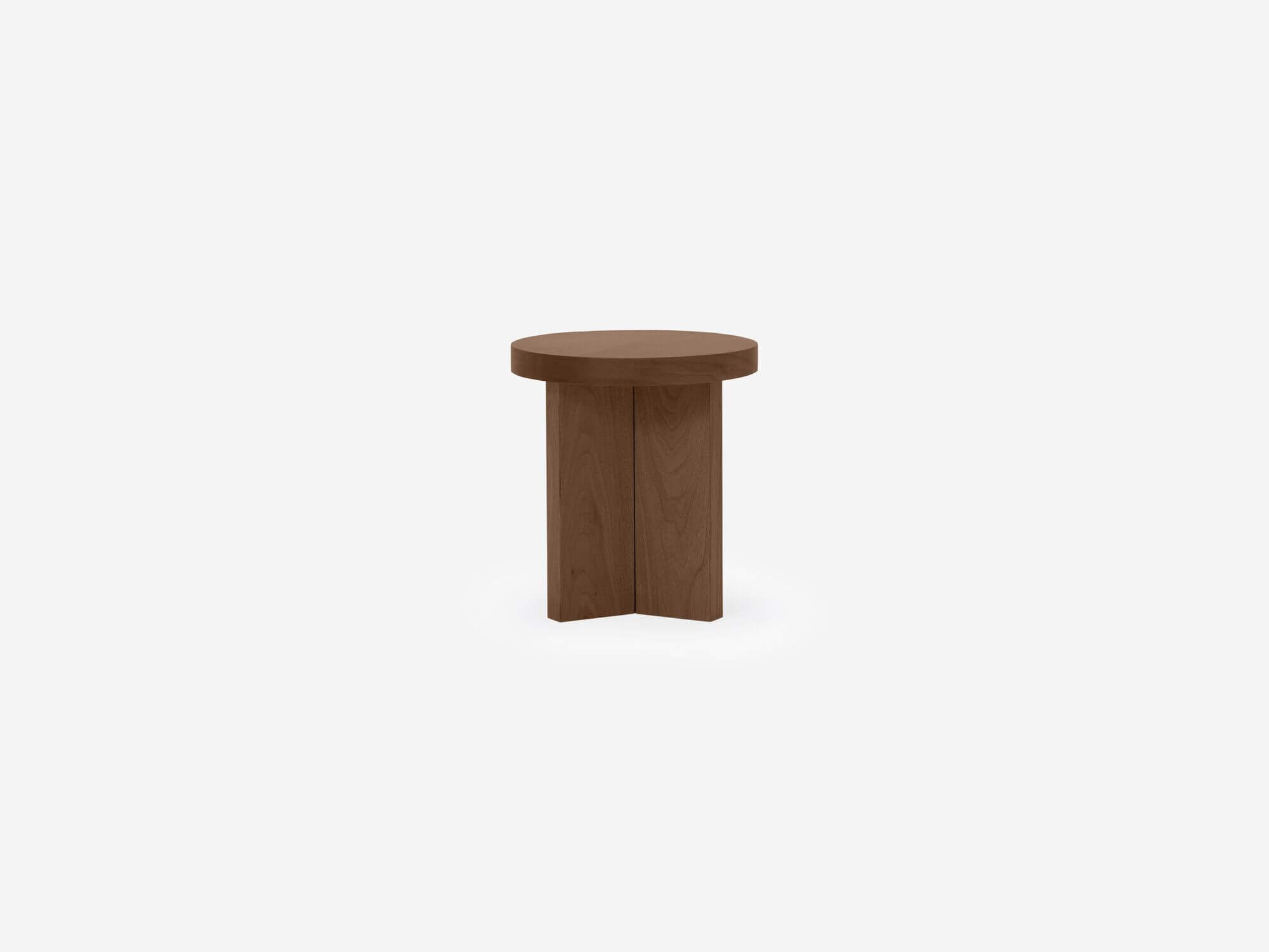 Front view of small round walnut end table